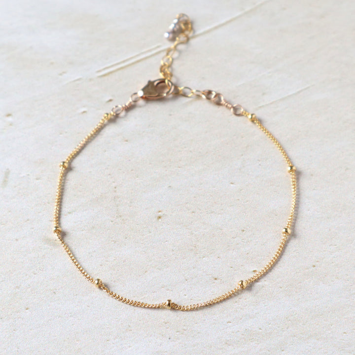 twinkle chain bracelet dainty spaced out bead chain in sterling silver or 14k gold filled