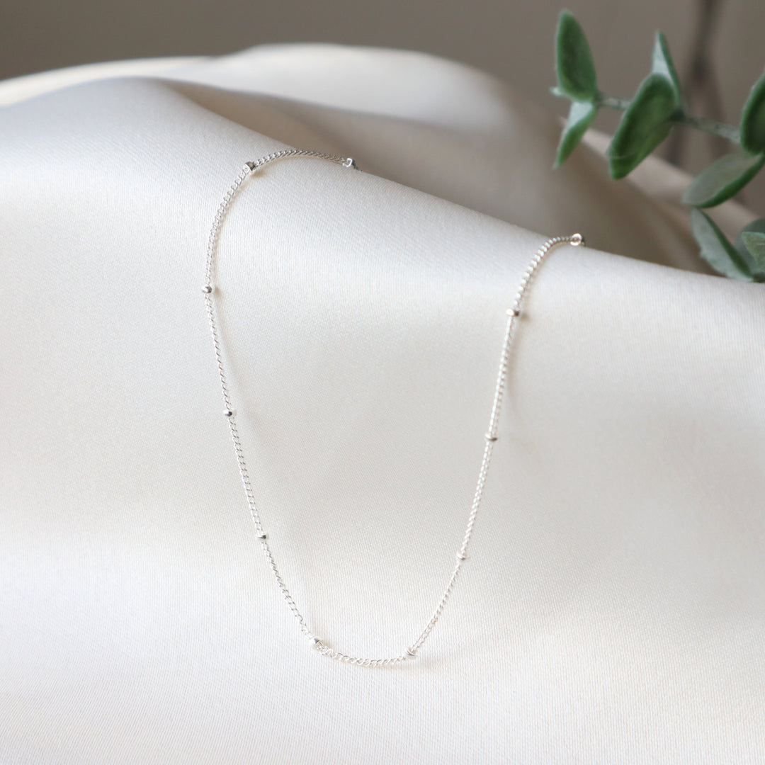 twinkle chain dainty chain necklace with spaced out beads in sterling silver or 14k gold filled