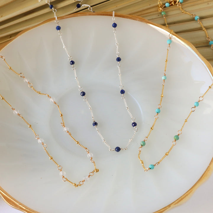birthstone necklaces in sterling silver or 14k gold filled with quartz, lapis and turquoise gemstones