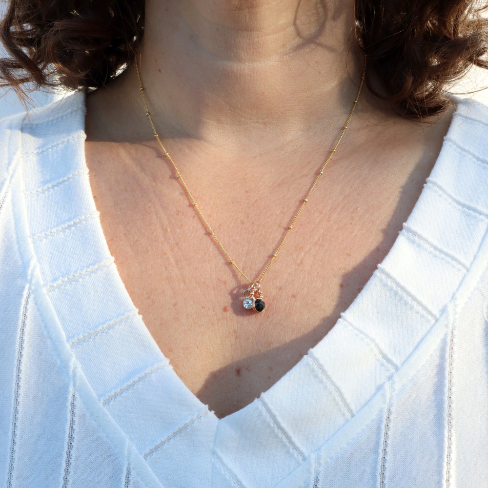 one of a kind charm necklace with black spinel and a clear cz in sterling silver or 14k gold filled