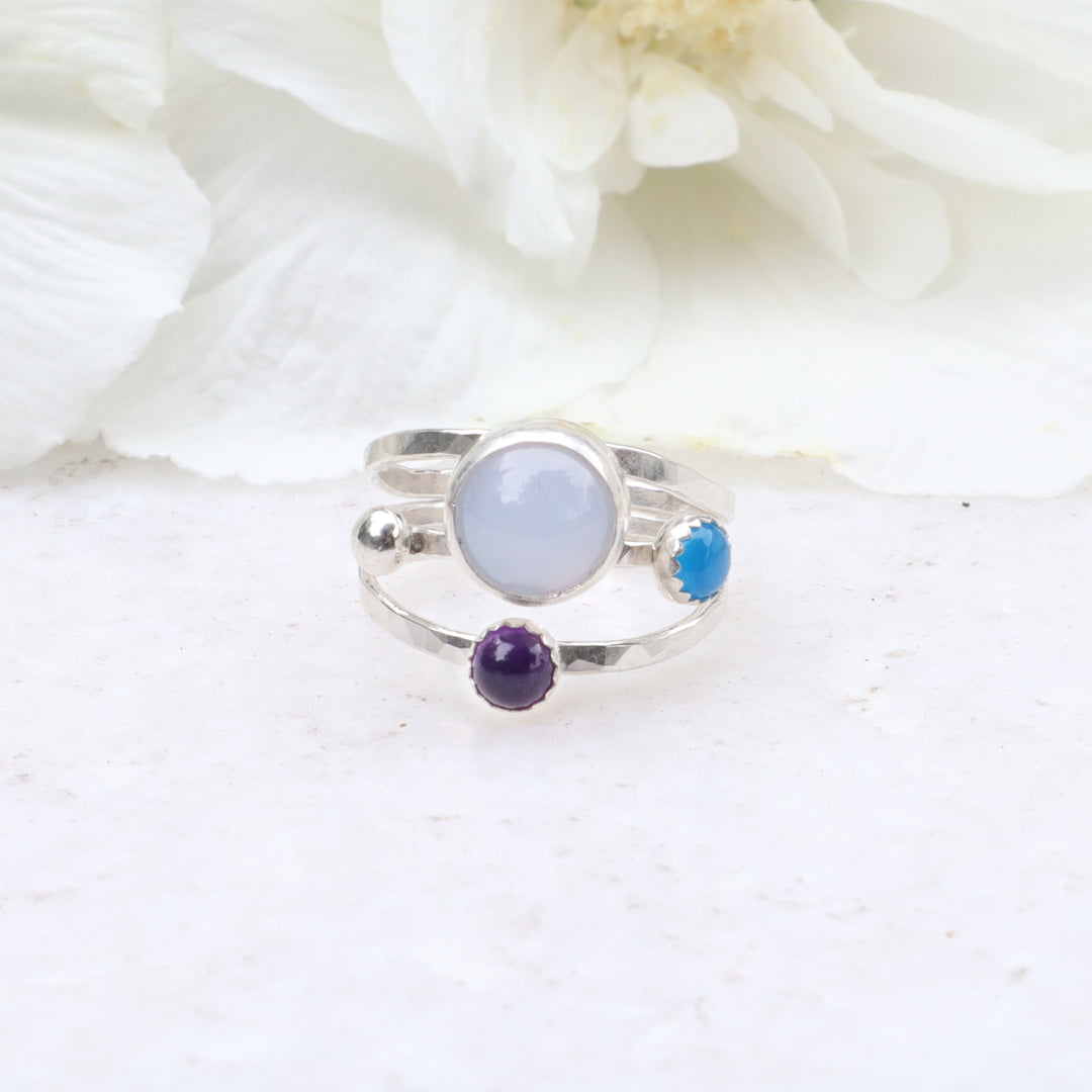 one of a kind sterling silver hammered triple ring band featuring blue chalcedony, blue onyx and amethyst gemstones