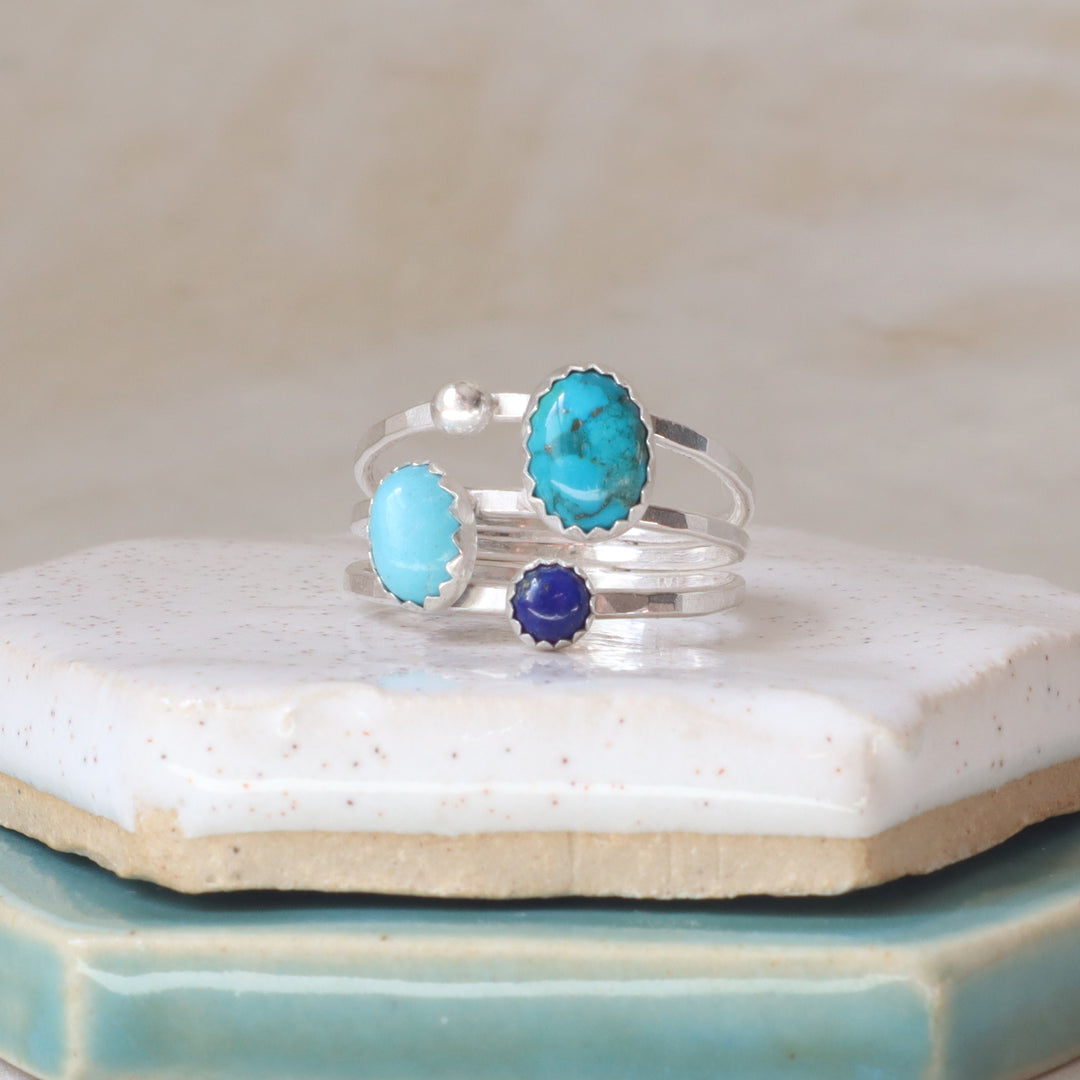 sterling silver one of kind ring with turquoise and lapis on a hammered triple band