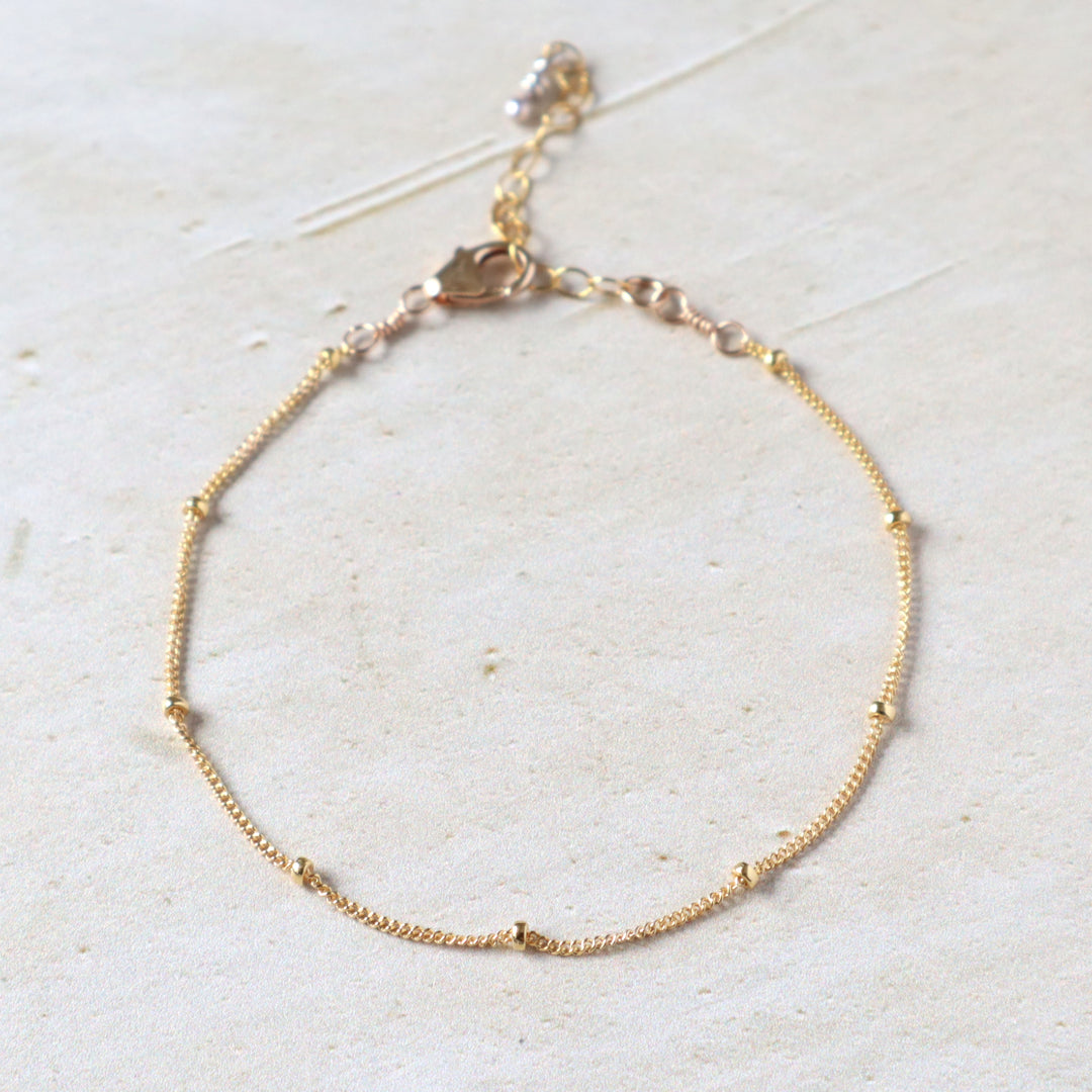 twinkle chain bracelet dainty spaced out bead chain in sterling silver or 14k gold filled