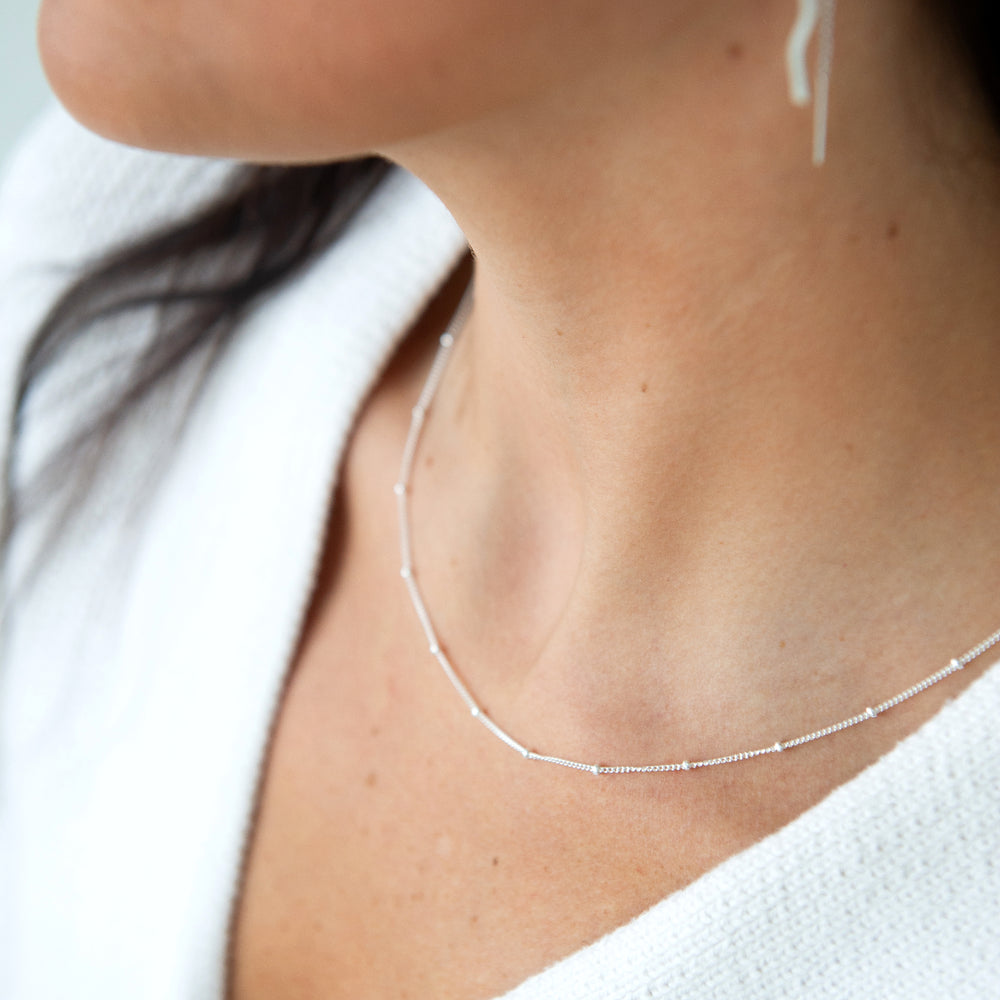 twinkle chain dainty chain necklace with spaced out beads in sterling silver or 14k gold filled