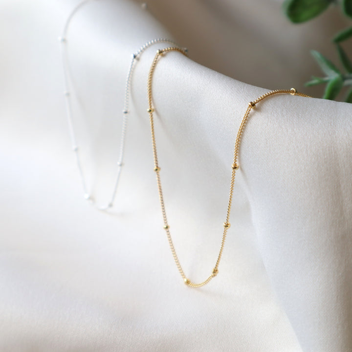 twinkle chain dainty chain necklace with spaced out beads in sterling silver or 14k gold filled
