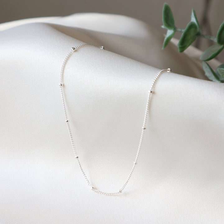 twinkle chain dainty chain necklace with spaced out beads in sterling silver or 14k gold filled