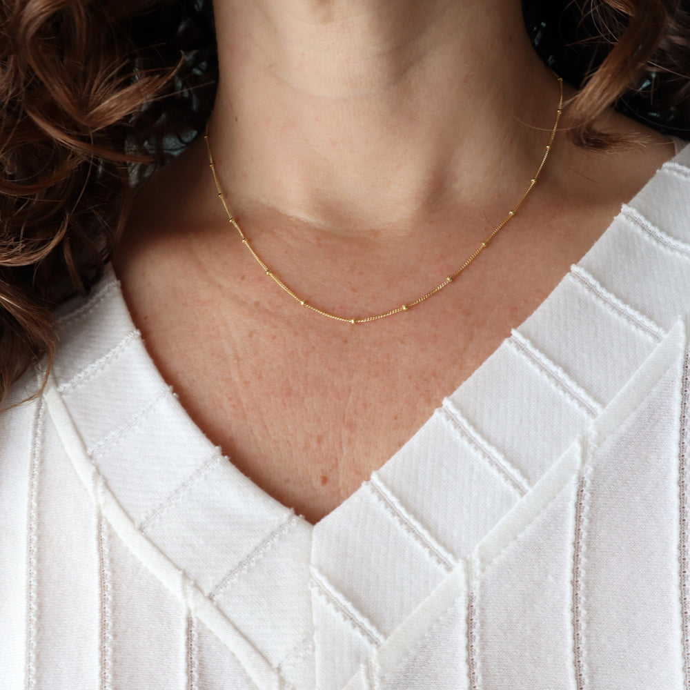 twinkle chain dainty chain necklace with spaced out beads in sterling silver or 14k gold filled
